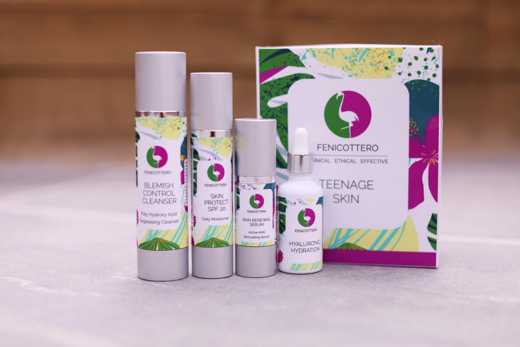 Teenage Skin Kit on marble with wood backdrop